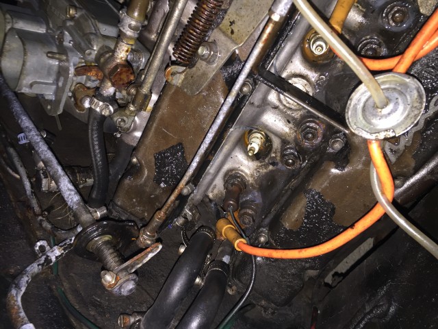 Magnesium valve cover with remainders of wrinkle paint. 2000 engine.