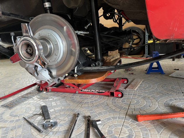Dropping rear suspension in one piece. I restored this last year.